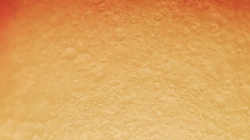 The foam has many bubbles floating around