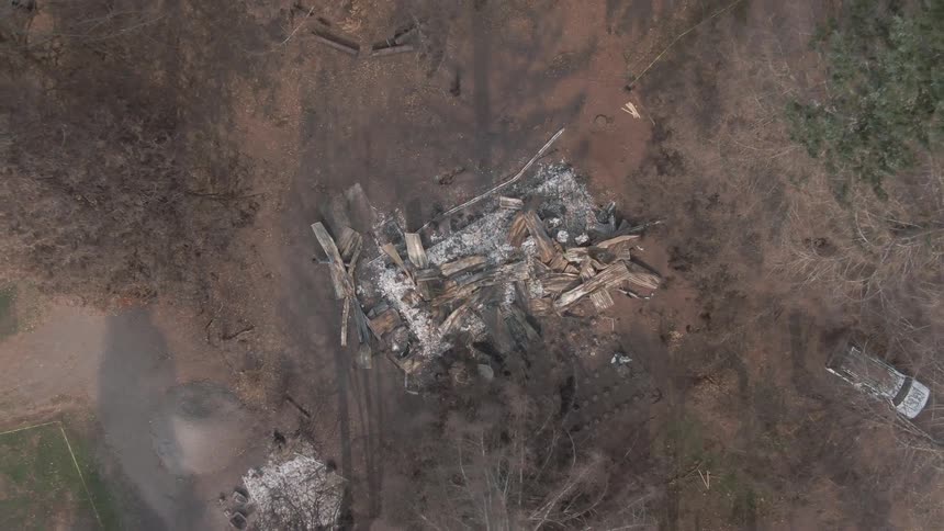 Aerial view of burning wood in a forest