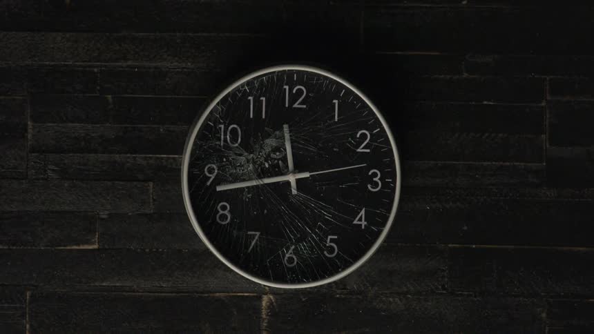 A wall clock ticks away the time