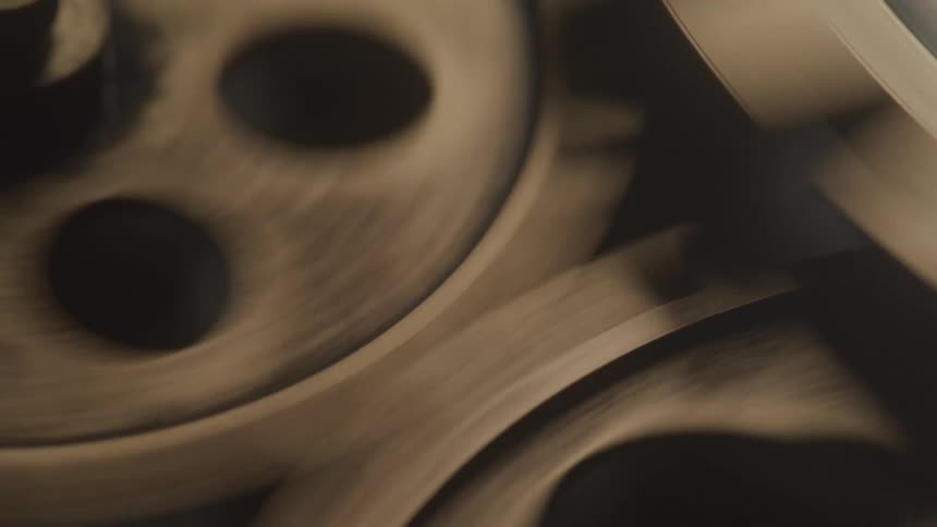Several gears spin together