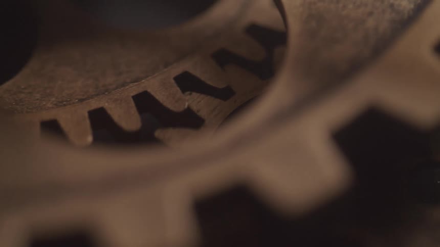 A metal cog spins
