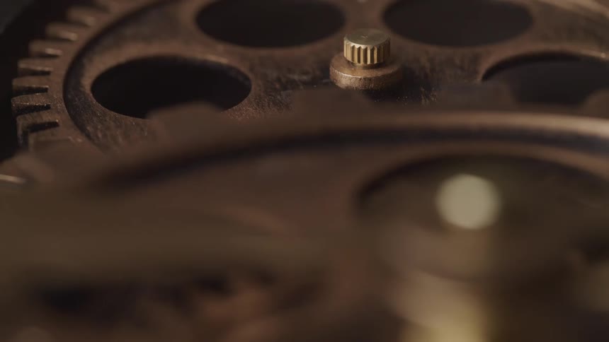 Metal antiqued gears turn slowly