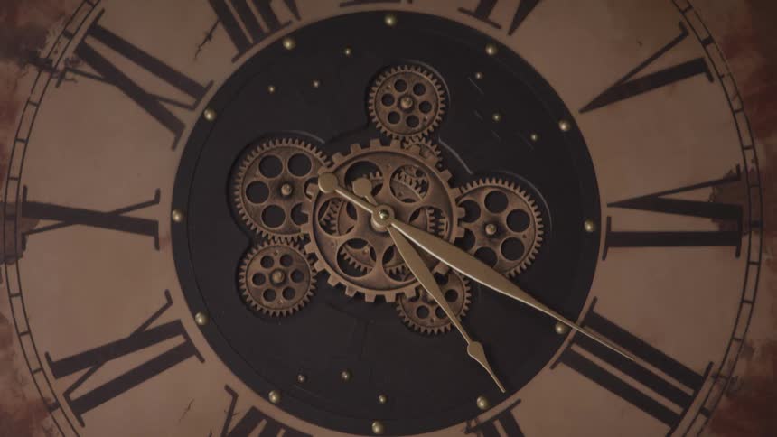 Cogs move in the center of a clock face