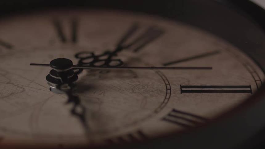 A close up of a clock face