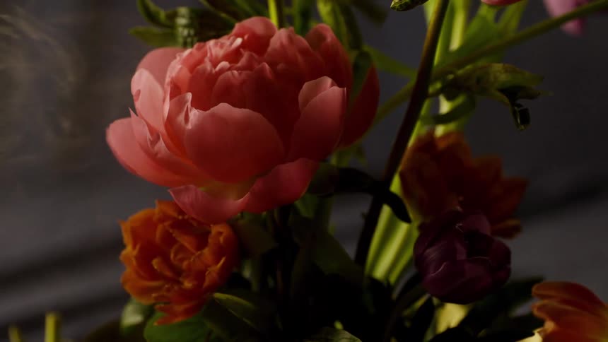 Roses with green stems in a bowl