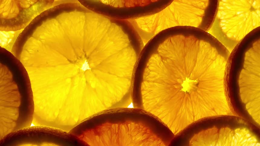 Extreme close up of several orange slices