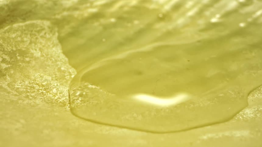 Water drips on the leaf and pools