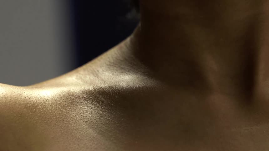 Closeup of a womans torso without a shirt