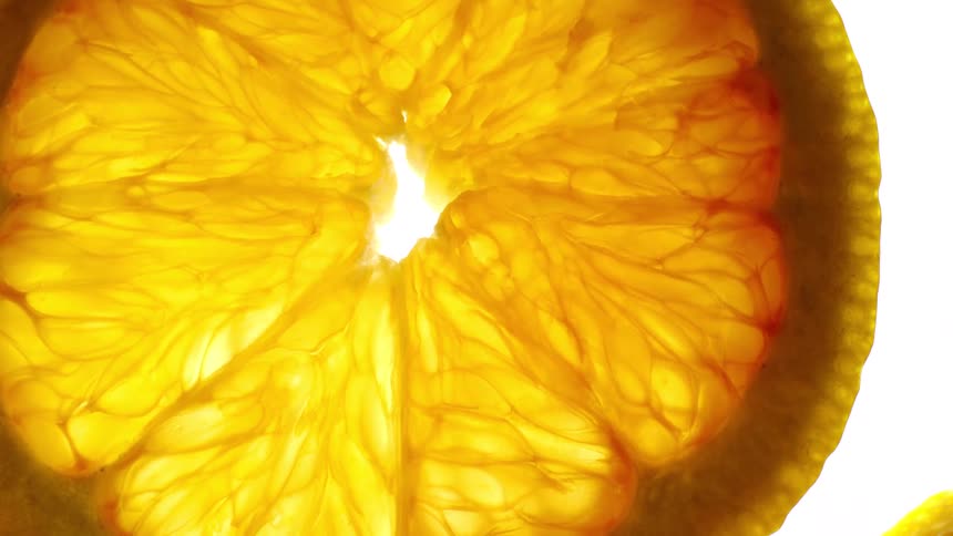 Slice of an orange against a white background