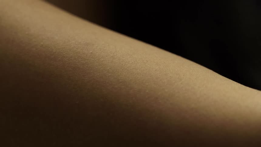 Extreme close up of the skin on a persons arm
