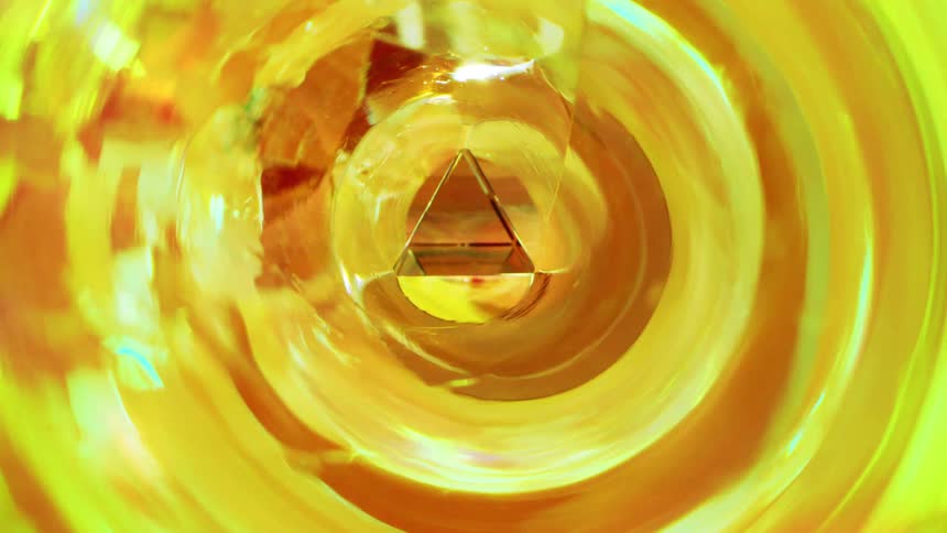 Abstract cylinder with a glowing triangle in the background