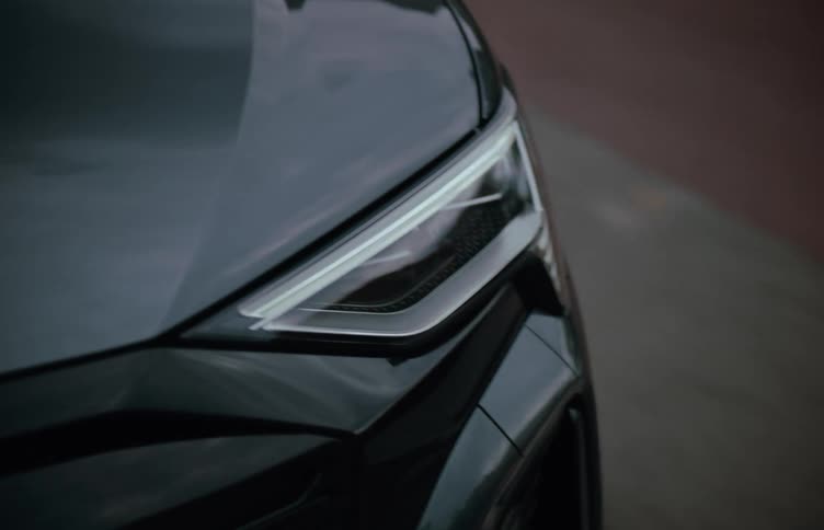 A car is driving on the road