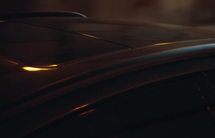 A car exits from the tunnel