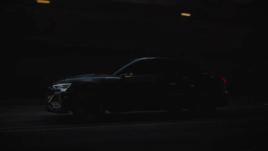 Car is driving fast under a tunnel on the highway