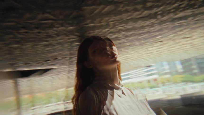 Redhead woman in an indoor space