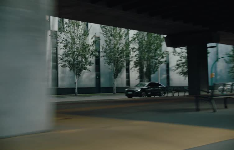 A car drives under the overpass