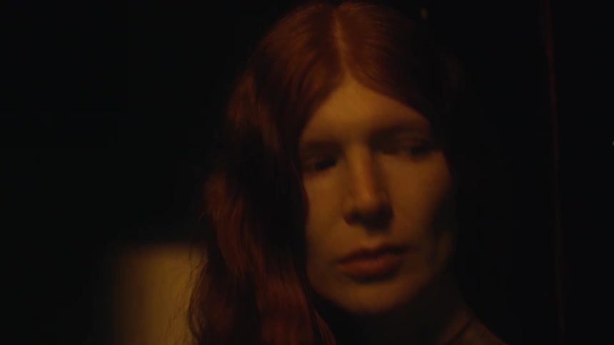 Lights flash on the womans face
