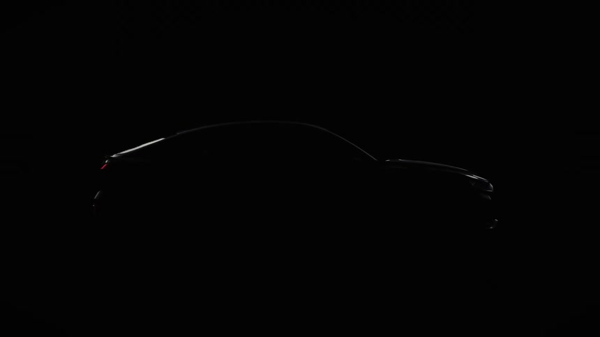 Modern vehicle in silhouette in a dark environment