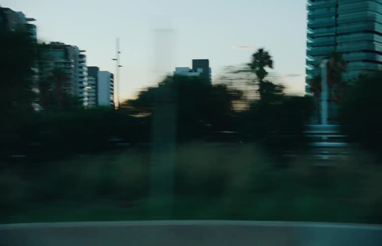 A car enters the highway from an onramp tracked in motion from a neighboring vehicle driving parallel along the adjacent lane