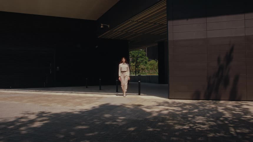 A woman walks in slow motion