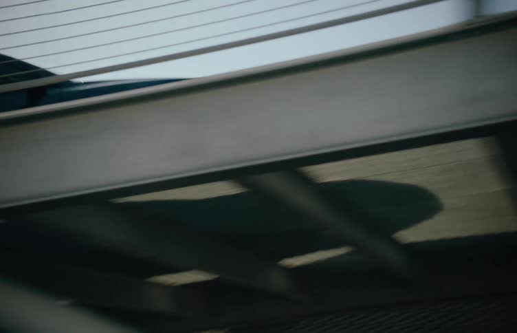 The car is slowly driving in the garage