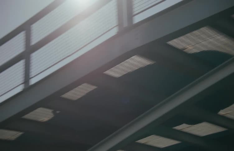 Car passing over a metal viaduct