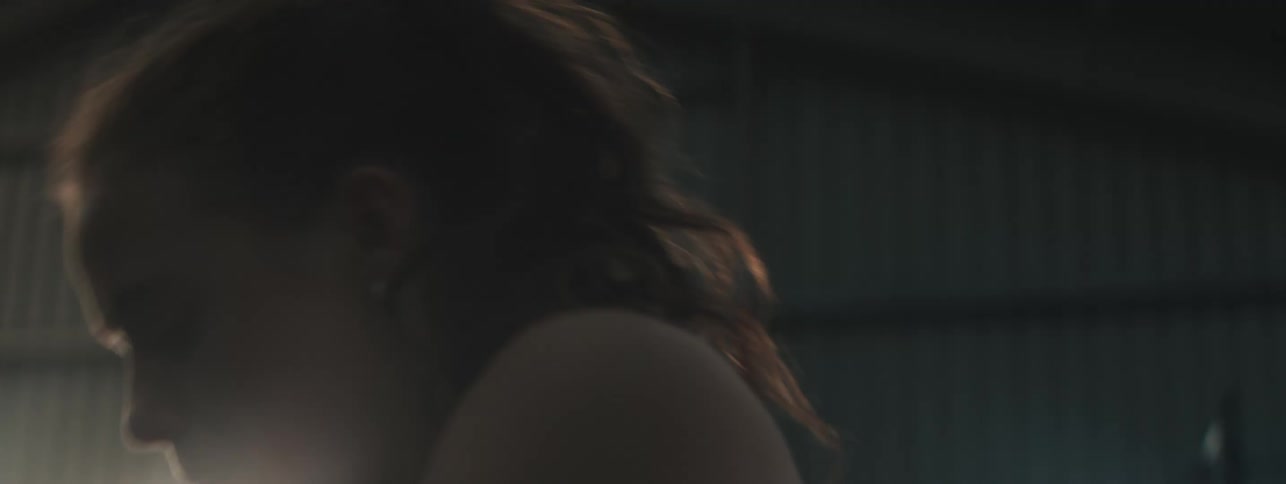 Close up of a young woman exhausted after a set of exercises in a fitness room