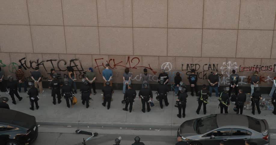 Protesters are being arrested by the building