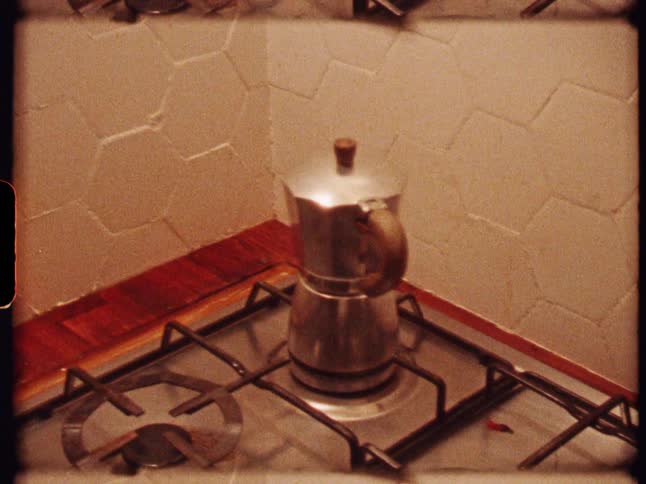 An old video of an old kettle on an old stove top