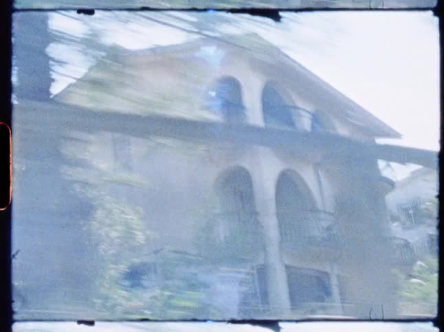 Driving past an old house