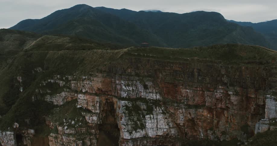 A canopy is on the cliff of the island