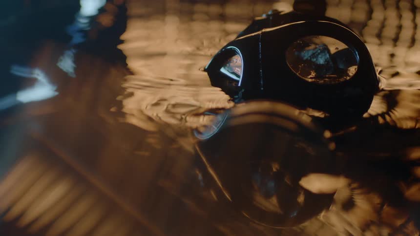 Object rising out of a pool of liquid