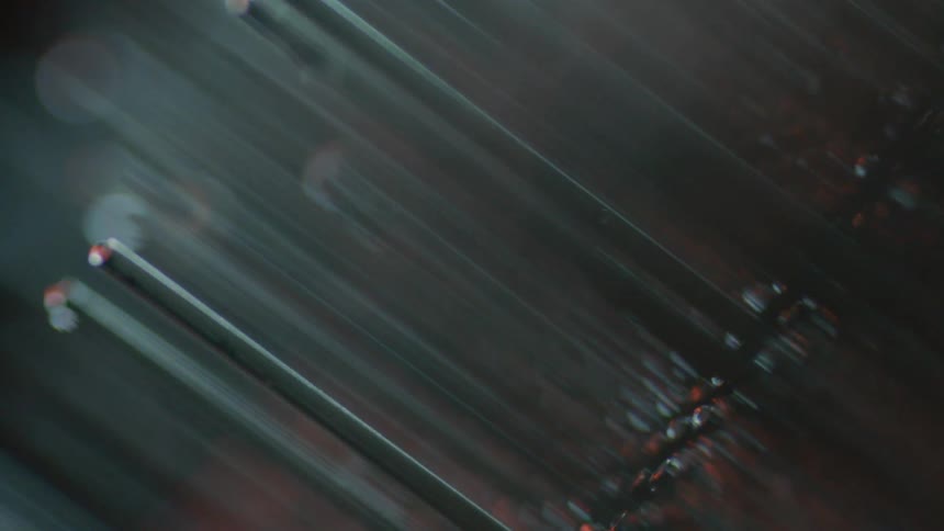 Metal pins fall into place