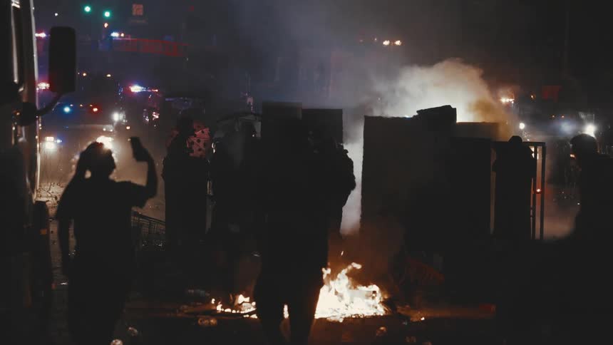 The protesters are burning things in the street