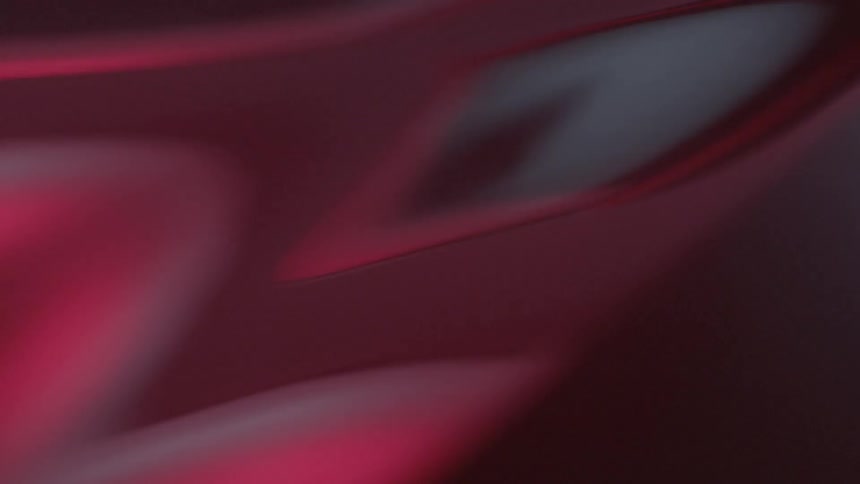 The surface is red and reflective