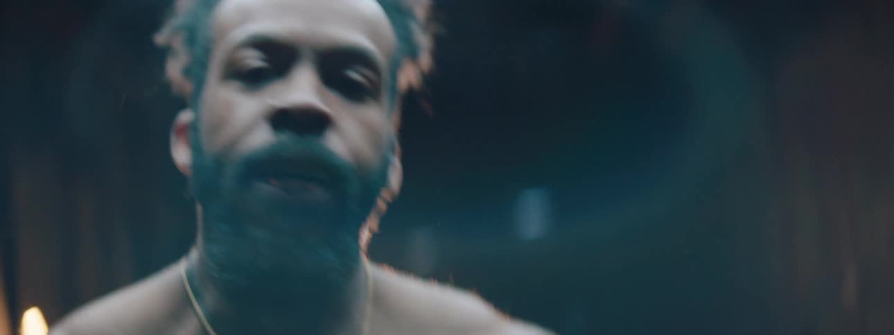 A man shouting and moving in a determined and aggressive way