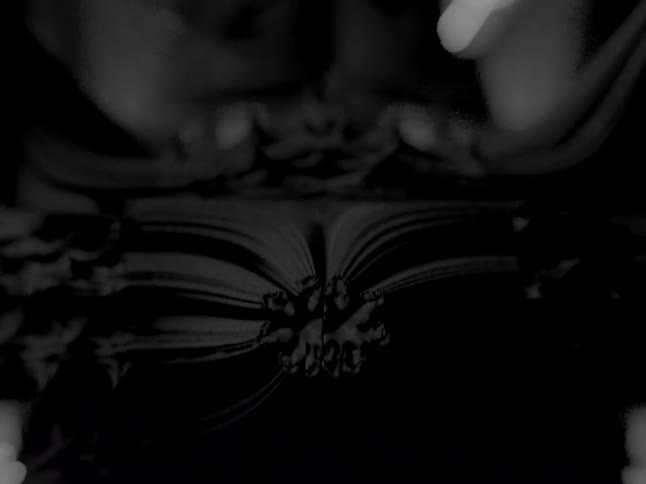 Abstract matter in motion against a black background