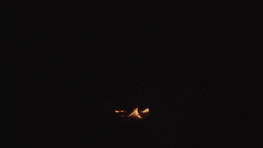 Small ember of fire in the dark