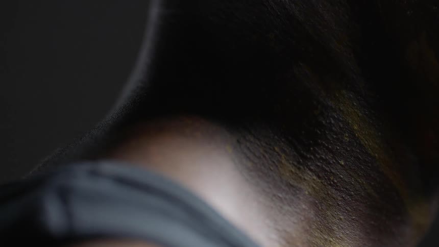 A man's neck is shown