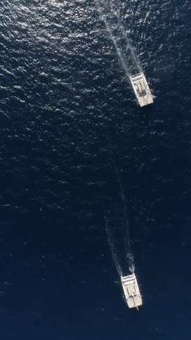 A couple boats in the ocean