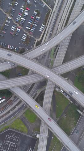 Aerial view of highways and overpasses with vehicle traffic