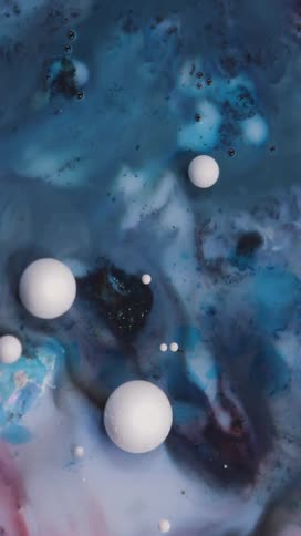 Blue and purple paint with white balls on top