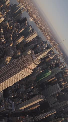 Aerial view of a metropolis on the edge of a sea canal