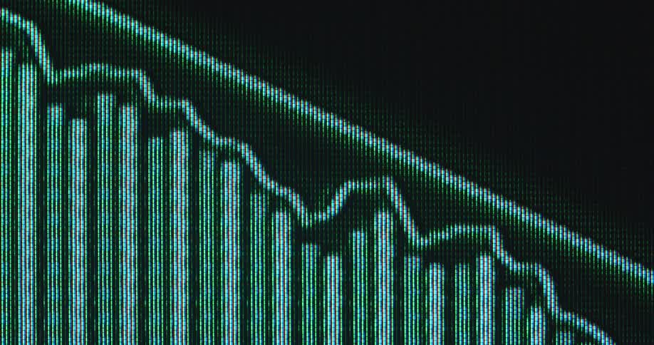 The neon green graph forms an old 90s computer screen showing a vintage user interface of a stock trading platform or exchange as the commodity and equity prices crash and a global recession hits the finance markets