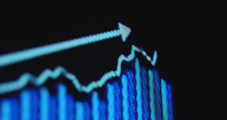 Rising blue candlestick chart against a black background of a pixelated computer screen displaying the user interface of an online trading platform or crypto currency exchange for trading bitcoin or other digital assets
