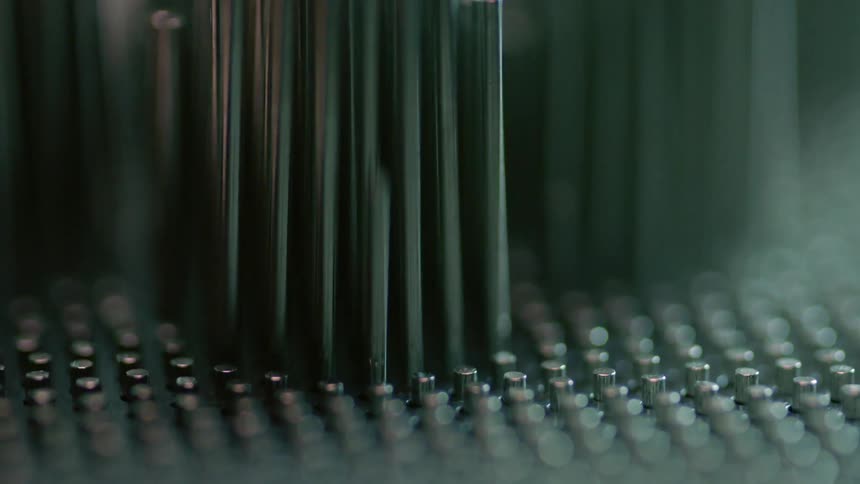 The metal pins slowly fall down