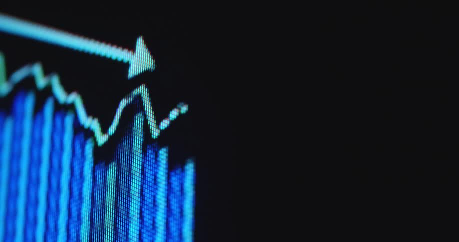 Blue candlestick chart with bars and white trendline arrow displayed on a pixel screen with negative downward price development as symbol for unsuccessful stock trading or bad investment strategies with negative market analysis