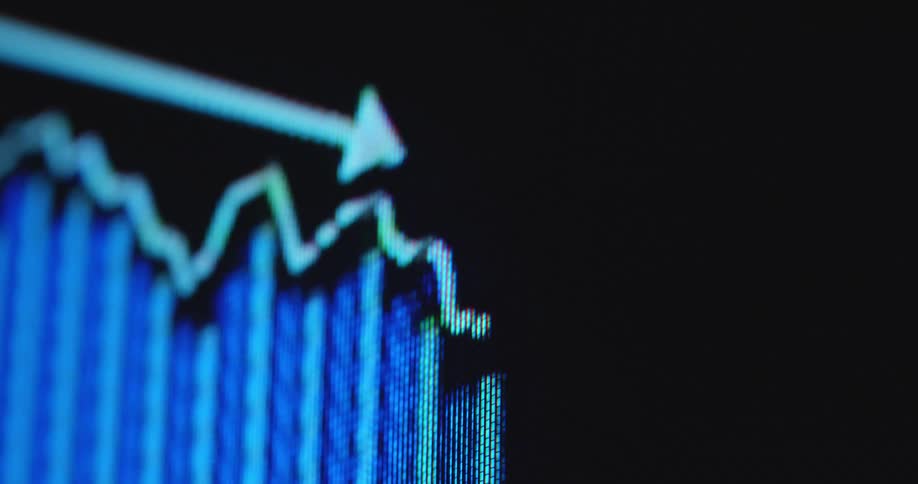 Dramatic macro view of data visualization or presentation showing a negative down trend with critical development as the digital graph or chart animation crashes symbolizing extreme volatility and economic decline and uncertainty