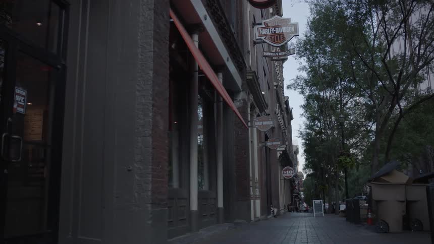 The sidewalk of this city is empty