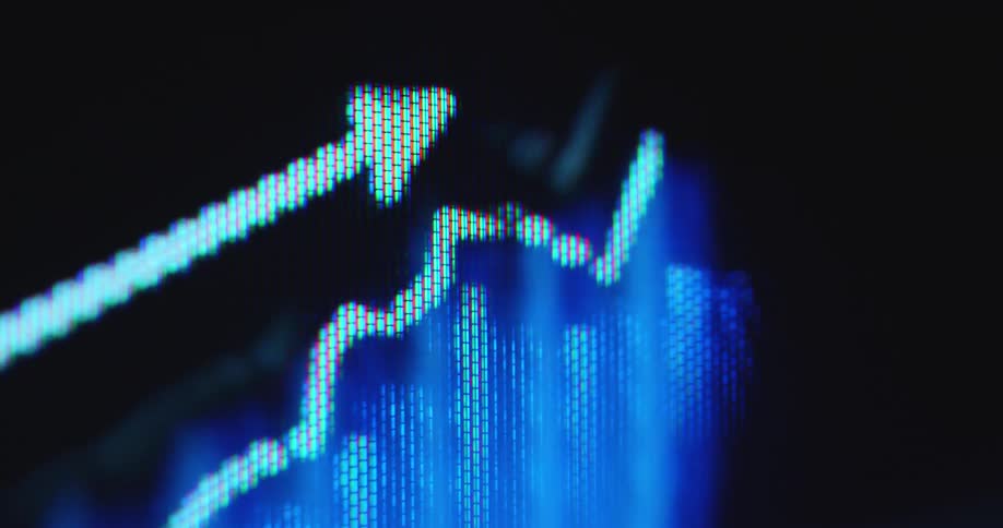 Dynamic dramatic macro footage with shaky movement of a stock trading chart or data graph animation moving upwards with a positive trend line indicating a stock market or crypto bull run and the increase in value of different assets